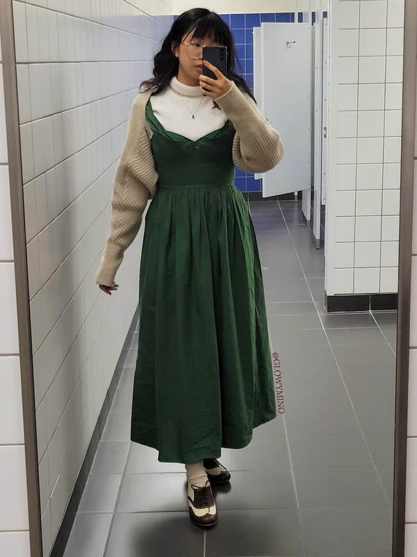 Issue 1's publishing night outfit shown via mirror selfie. The outfit conveys hints of storybook, princess, and cottagecore fashion aesthetics.