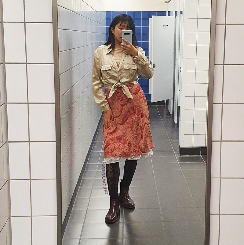 A mirror selfie wearing issue 5's pub night outfit