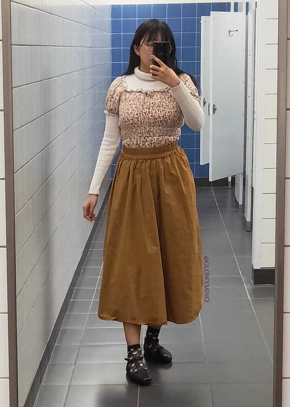Mirror selfie wearing issue 8's pub night outfit